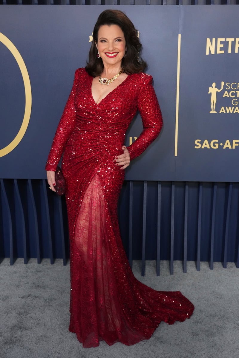 Fran Drescher in a sparkling red dress by Lebanese designer Reem Acra. AP