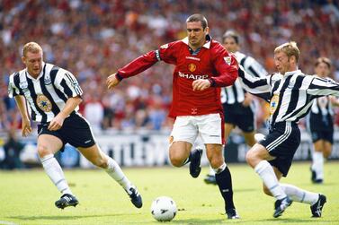 LONDON, UNITED KINGDOM - AUGUST 11: Manchester United player Eric Cantona (c) beats Steve Watson and David Batty (r) during the FA Charity Shield match between Manchester United and Newcastle United at Wembley Stadium on August 11, 1996 in London, England. (Photo by Shaun Botterill/Getty Images)