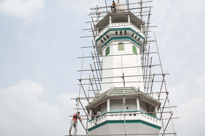 The minaret of Mamburam Grand Juma Masjid is being maintained in Mampuram, Kerala, India. Photo by Sebastian Castelier