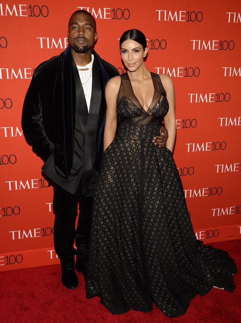 epa04715347 US musician Kanye West (L) and his wife Kim Kardashian (R) arrive for the Time 100 Gala at Frederick P. Rose Hall in New York, New York, USA, 21 April 2015. The event is a celebration of Time Magazine's annual issue recognizing 100 of the world's most influential people.  EPA/JUSTIN LANE