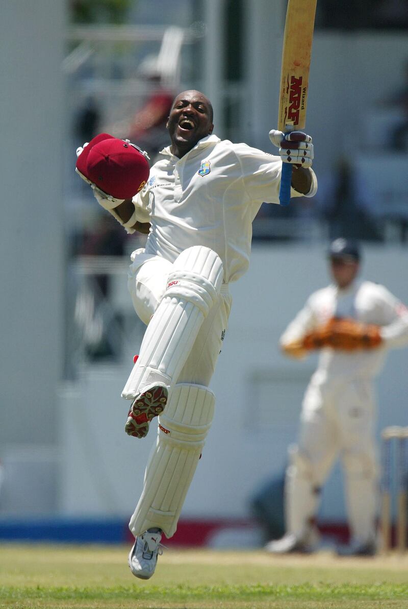 ST JOHNS, ANTIGUA - APRIL 12:  Brian Lara breaks the world test batting total record during day three of the fourth Test match between the West Indies and England at the Recreation Ground on April 12, 2004 in St Johns, Antigua. (Photo by Clive Rose/Getty Images)