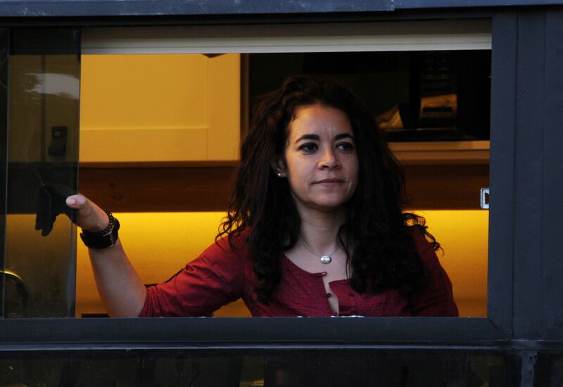 Yara Shalabi looks out from her new home.