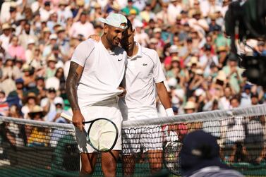 LONDON, ENGLAND - JULY 10: Novak Djokovic of Serbia and Nick Kyrgios of Australia interact by the net following their Men's Singles Final match on day fourteen of The Championships Wimbledon 2022 at All England Lawn Tennis and Croquet Club on July 10, 2022 in London, England. (Photo by Ryan Pierse / Getty Images)