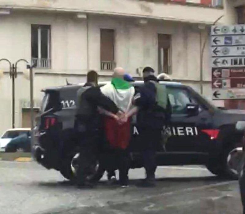 The suspected shooter that opened fire on African migrants, identified as Luca Traini, 28, is seen detained by Italian Carabinieri in Macerata, Italy February 3, 2018. Italian Carabinieri/Handout via REUTERS ATTENTION EDITORS - THIS PICTURE WAS PROVIDED BY A THIRD PARTY