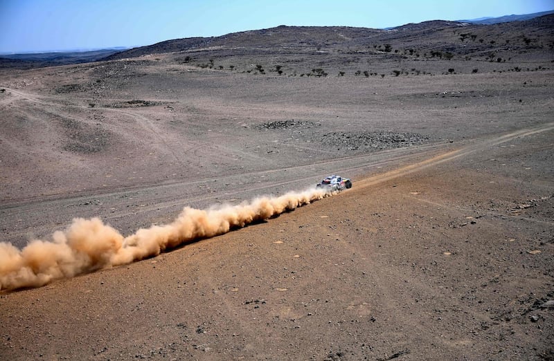 Spain's Carlos Sainz and co-driver Lucas Cruz compete during Stage 1. AFP