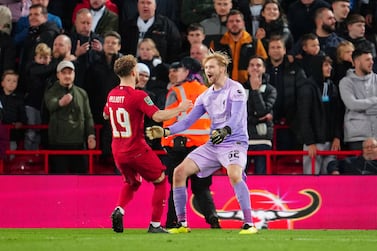 Liverpool goalkeeper Caoimhin Kelleher, right, celebrates with teammate Harvey Elliott after the English League Cup soccer match between Liverpool and Derby County, at Anfield Stadium, in Liverpool, England, Wednesday Nov.  9, 2022.  (AP Photo / Jon Super)