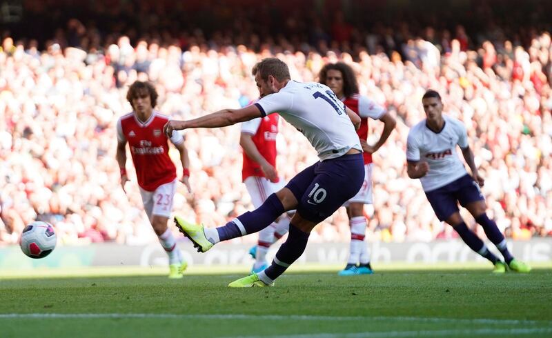 Tottenham's Harry Kane scores from the penalty spot to give Spurs a 2-0 lead at the Emirates. EPA