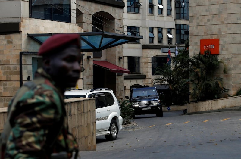 A vehicle is seen as a member of the security forces keeps a look out. Thomas Mukoya / Reuters