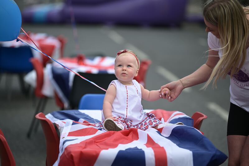 A young resident is pictured at a street party on Donegall Pass in Belfast. Getty Images