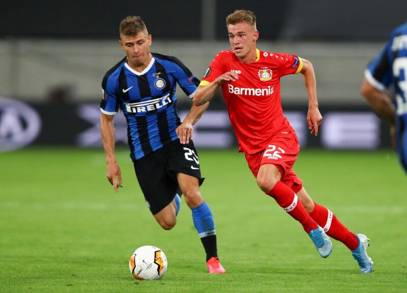 Leverkusen's Daley Sinkgraven, right, and Nicolo Barella of Inter Milan battle for possession. AP