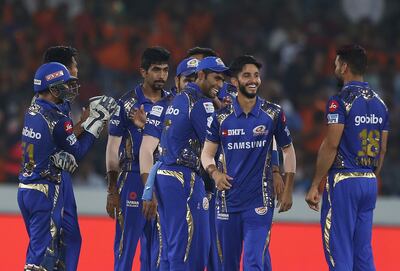 Mumbai Indian bowler Mayank Markande , second from right, celebrates the wicket of Wriddhiman Saha with their team during VIVO IPL cricket T20 match against Sunrisers Hyderabad in Hyderabad, India, Thursday, April 12, 2018. (AP Photo/Mahesh Kumar A.)