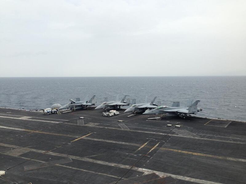 The flight deck of the USS George HW Bush is pictured as the aircraft carrier transits the Arabian Gulf on March 21, 2017.