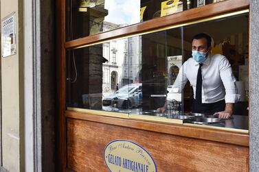 An external view of a bar that makes home deliveries during phase 2 of the coronavirus emergency, in Turin, Italy. EPA