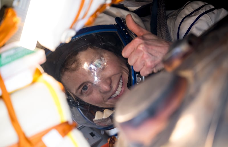 Nasa astronaut Loral O'Hara gives a thumbs up inside the Soyuz MS-24 spacecraft after she, Russian cosmonaut Oleg Novitskiy and Marina Vasilevskaya, from Belarus, landed in a remote area of Kazakhstan after their missions aboard the International Space Station. Getty Images
