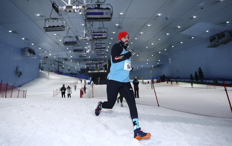 A runner competes in the DXB Snow Run during DXB Snow Week at Ski Dubai on August 14, 2020. Getty Images
