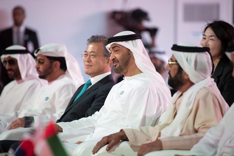 AL DHAFRA, ABU DHABI, UNITED ARAB EMIRATES - March 26, 2018: HH Sheikh Tahnoon bin Mohamed Al Nahyan, Ruler's Representative in Al Ain Region (R), HH Sheikh Mohamed bin Zayed Al Nahyan Crown Prince of Abu Dhabi Deputy Supreme Commander of the UAE Armed Forces (2nd R), HE Moon Jea-In, President of South Korea (3rd R), HH Sheikh Hamdan bin Zayed Al Nahyan, Ruler’s Representative in Al Dhafra Region (4th R) and HH Sheikh Nahyan Bin Zayed Al Nahyan, Chairman of the Board of Trustees of Zayed bin Sultan Al Nahyan Charitable and Humanitarian Foundation (L), attend the Unit One Construction Completion Celebration, at Barakah Nuclear Energy Plant. 

( Abdullah Al Junaibi )
---