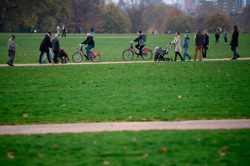 People spend their weekend in Hyde Park in central London. AFP