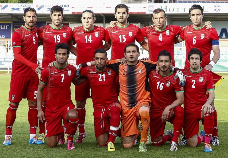 Iranian national soccer team players (front row, left to right) Masoud Shojaei, Ashkan Dejagah, goalkeeper Rahman Ahmadi, Reza Ghoochannejhad and Khosro Heydari; (back row, left to right) Amir Hossein Sadeghi, Hashem Beikzadeh, Andranik Teymourian, Pejman Montazeri, Jalal Hosseini and captain Javad Nekounam. Erwin Scheriau / EPA