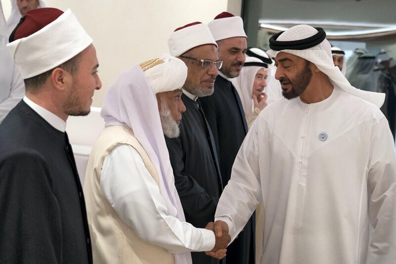 ABU DHABI, UNITED ARAB EMIRATES - May 21, 2018: HH Sheikh Mohamed bin Zayed Al Nahyan Crown Prince of Abu Dhabi Deputy Supreme Commander of the UAE Armed Forces (R), receives a guest of HH Sheikh Khalifa bin Zayed Al Nahyan, President of the UAE and Ruler of Abu Dhabi, prior to a lecture by Omar Habtoor Al Darei titled "Reclaiming Religion In The Age of Extremism", at Majlis Mohamed bin Zayed. 

( Hamad Al Kaabi / Crown Prince Court - Abu Dhabi )
---