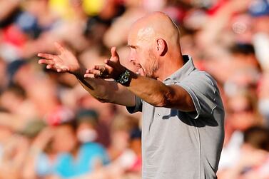 Manchester United's Dutch manager Erik ten Hag gestures on the touchline during the English Premier League football match between Brentford and Manchester United at Gtech Community Stadium in London on August 13, 2022.  (Photo by Ian Kington / AFP) / RESTRICTED TO EDITORIAL USE.  No use with unauthorized audio, video, data, fixture lists, club/league logos or 'live' services.  Online in-match use limited to 120 images.  An additional 40 images may be used in extra time.  No video emulation.  Social media in-match use limited to 120 images.  An additional 40 images may be used in extra time.  No use in betting publications, games or single club/league/player publications.   /  