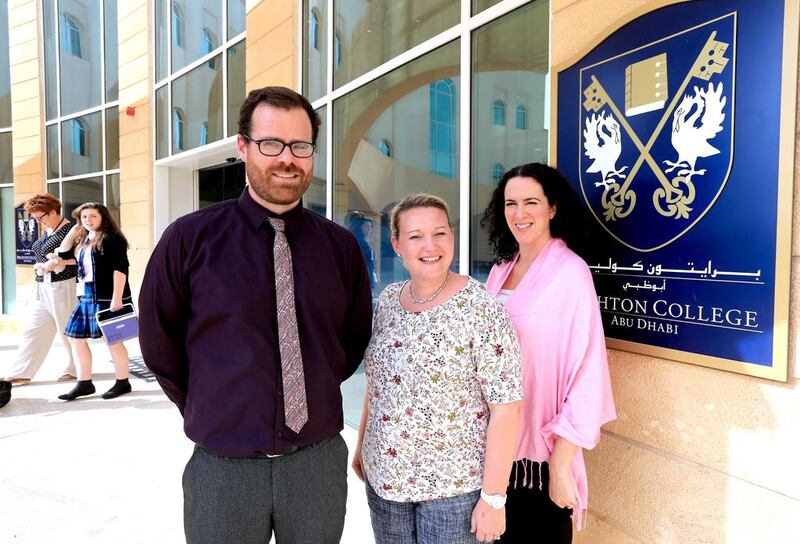 Andrew McLoughlin, English teacher, Ruth Forsythe, director of music and Louise Brashier, geography teacher, at Brighton College in Abu Dhabi. Ravindranath K / The National 