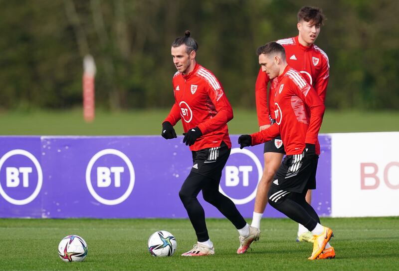 Wales' Gareth Bale and Connor Roberts during training at the Vale Resort. PA