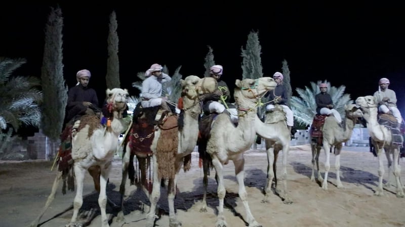 Members of the Al Faqeer tribe await their visitors on camels. Suhail Rather/TheNational