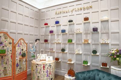The full Giles x Aspinal collection at the flagship Dubai store. Aspinal of London