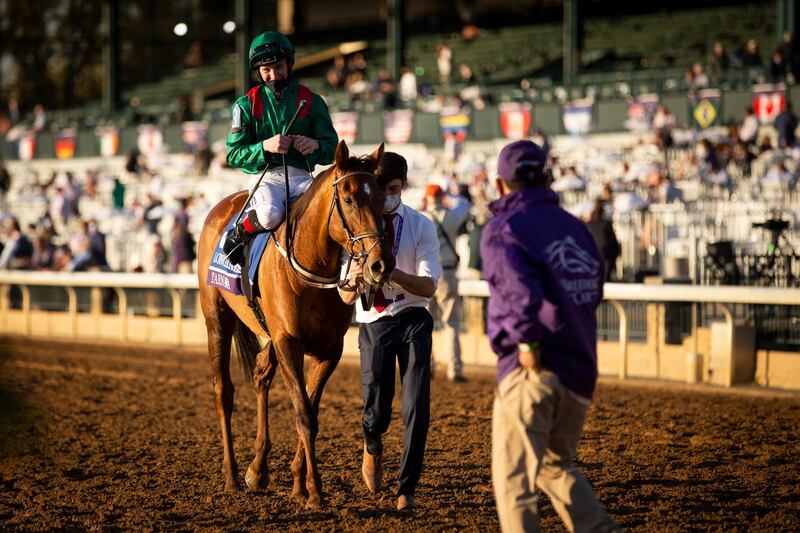 Tarnawa with Christophe Soumillon walk back after winning the Longines Breeders' Cup Turf race. Reuters