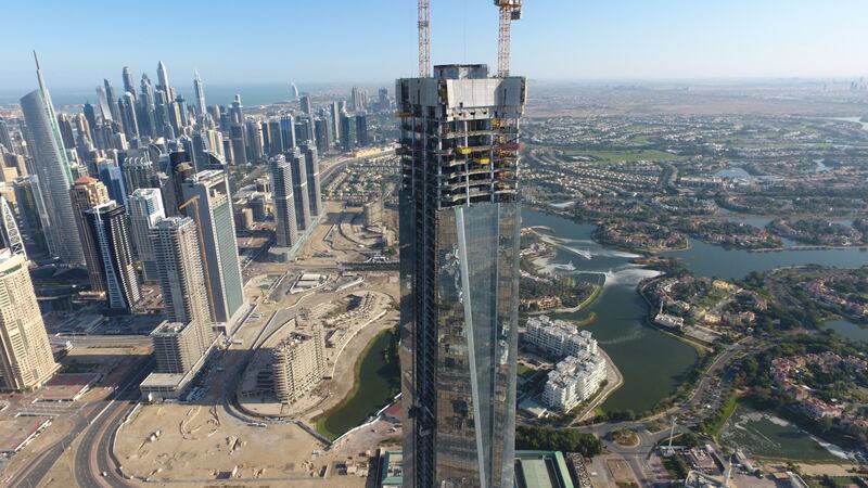 The building will reach 340 metres when its steel crown is added in a couple of months. Photo: DMCC