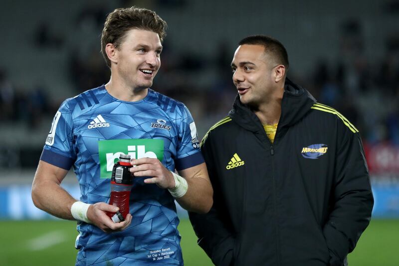 Beauden Barrett of the Blues speaks with Chase Tiatia of the Hurricanes after winning the round 1 Super Rugby match at Eden Park. Getty