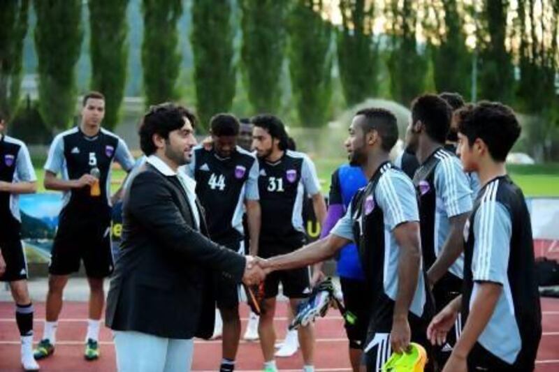 Sheikh Abdullah bin Mohammad, chairman of Al Ain, meets the players during their 2013 pre-season training camp. Courtesy Al Ain FC