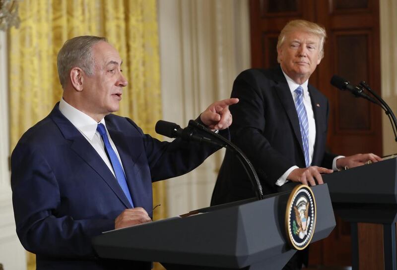 President Donald Trump listens as Israeli Prime Minister Benjamin Netanyahu speaks during their joint news conference in the East Room of the White House in Washington, Wednesday, February 15, 2017. Pablo Martinez Monsivais / AP 