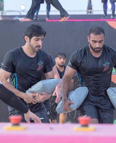 Sheikh Hamdan and Bader Al Nouri, a member of Sheikh Hamdan's F3 training team, pictured during the Gov Games in April. Lt Bader will be among the guests attending the Crown Prince's wedding in Dubai on Thursday. Ali Essa / Crown Prince of Dubai's Official Photographer 