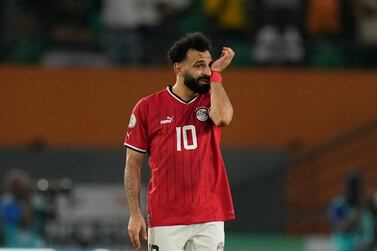 Egypt's Mohamed Salah reacts after Mozambique scored their second goal during the African Cup of Nations Group B soccer match between Egypt and Mozambique in Abidjan, Ivory Coast, Sunday, Jan.  14, 2024.  (AP Photo / Themba Hadebe)