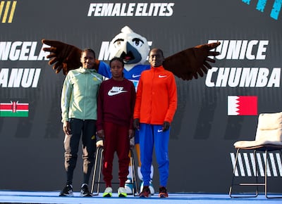 Left to right: Angela Tanui, Mare Dibaba and Eunice Chumba ahead of the Abu Dhabi Marathon. Victor Besa / The National