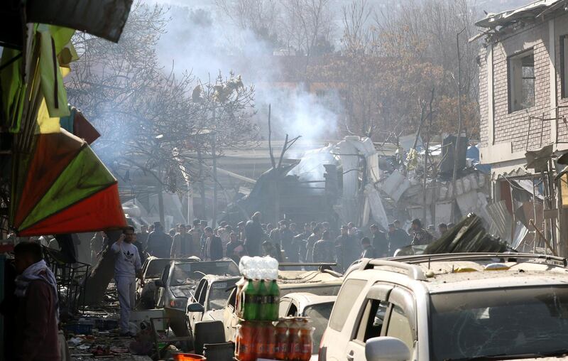 Smoke billows from the scene of a suicide bomb attack in Kabul, Afghanistan. Hedayatullah Amid / EPA