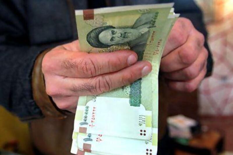 The Iranian government in September used security forces to arrest currency dealers and attempted to impose its own exchange rates. Ali Al Saadi / AFP