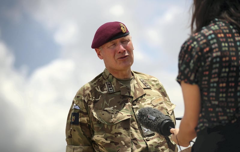 British Lieutenant General Sir John Lorimer speaks during an interview with Reuters at Beirut's port, damaged after a blast in Beirut, Lebanon, August 10, 2020. REUTERS/Hannah McKay