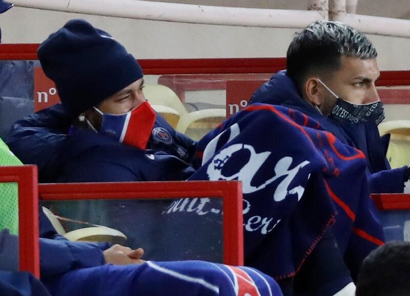 Neymar and Leandro Paredes are seen on the bench during the match. Reuters