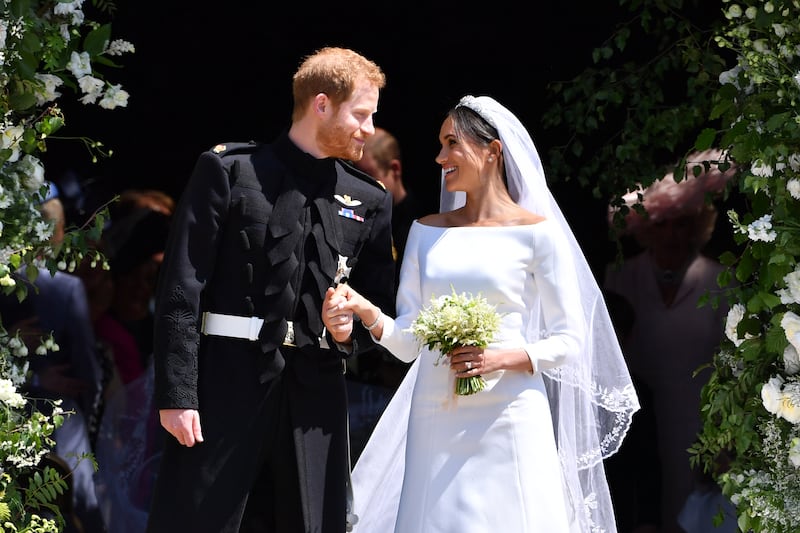 Prince Harry and Meghan leave St George's Chapel, Windsor Castle, on their wedding day in May 2018. Getty Images