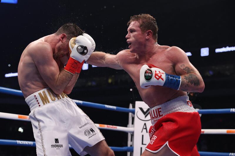 DCanelo Alvarez (red) and Callum Smith during their WBA, WBC and Ring Magazine super middleweight championship bout at the Alamodome in San Antonio. USA Today