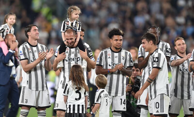 Juventus' Giorgio Chiellini, second left, and Paulo Dybala, second right, during an end-of-season ceremony. EPA