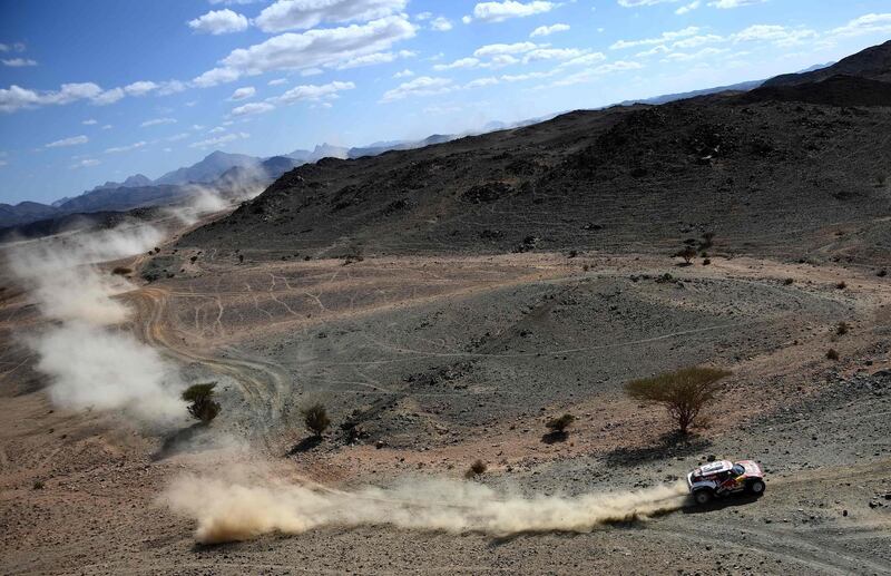 Stephane Peterhansel and co-driver Paulo Fiuza during Stage 2.  AFP