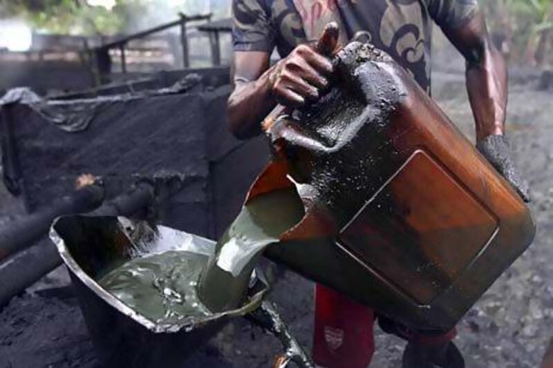 Many Nigerians hack into pipelines to steal crude and then refine or sell it abroad. Akintunde Akinleye / Reuters