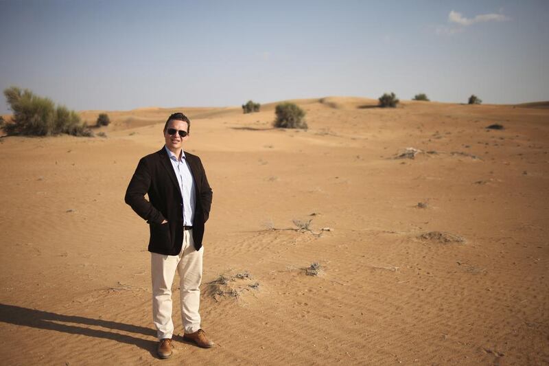 Adam McEwan, the managing director of Platinum Heritage Tours, on the grounds of his company's conservation plot. The grounds make up the largest animal conservation area in the UAE according to the company. The company also has the largest fleet of vintage Land Rovers in the area. Lee Hoagland / The National
