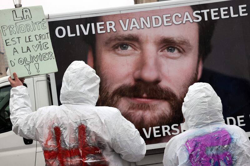 Protesters call for Olivier Vandecasteele's release in Brussels last year. AFP