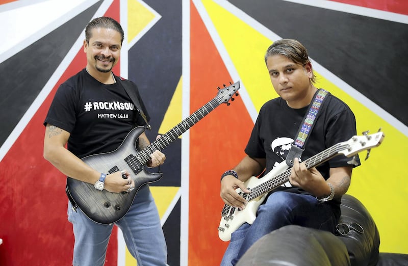 DUBAI , UNITED ARAB EMIRATES , February 14 – 2019 :- Left to Right – Rajesh Pereira and Neil Thompson from Rock and Soul band at the St Francis of Assisi Catholic Church in Jebel Ali in Dubai.  ( Pawan Singh / The National ) For News. Story by Patrick