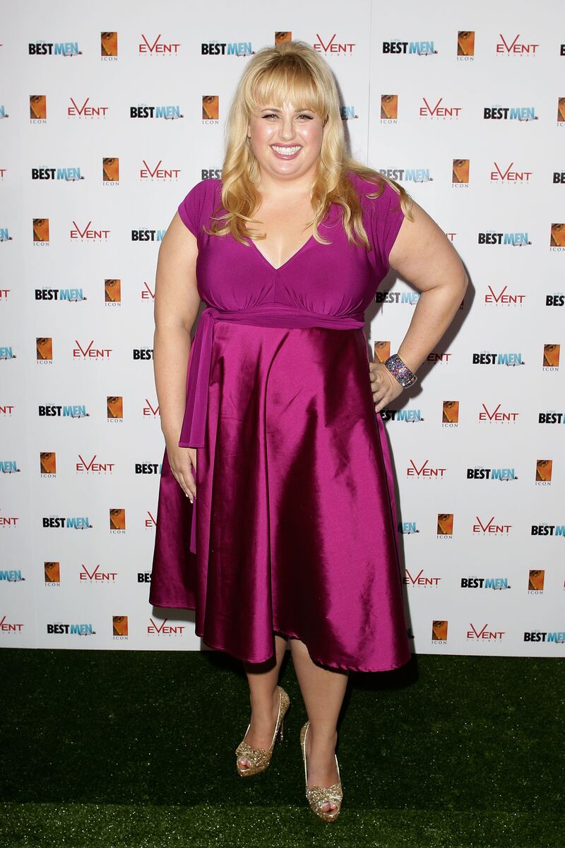 Rebel Wilson, in a pink dress, arrives at the 'A Few Best Men' premiere on January 16, 2012 in Sydney. Getty Images