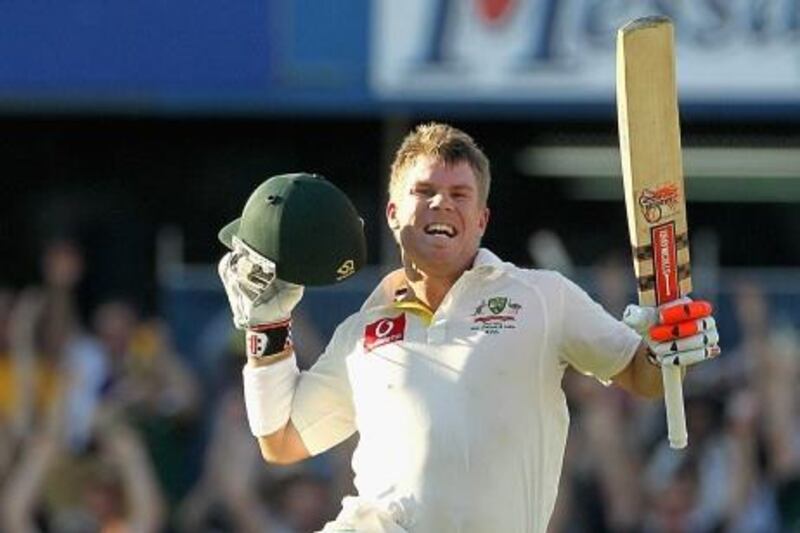 PERTH, AUSTRALIA - JANUARY 13:  David Warner of Australia celebrates his century during day one of the third Test match between Australia and India at WACA on January 13, 2012 in Perth, Australia.  (Photo by Hamish Blair/Getty Images) *** Local Caption ***  136930111.jpg
